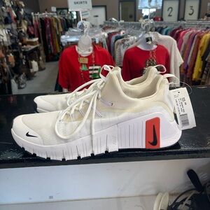 Nike White Sneakers with Orange Detail